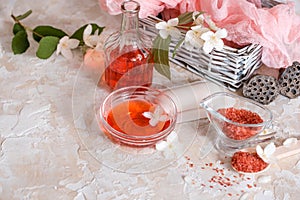 Spa set: scented candle, sea salt, liquid soap and romantic red roses