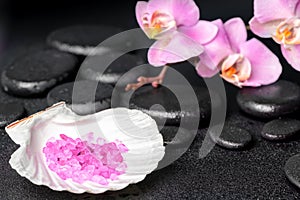 Spa setting of zen stones, lilac orchid