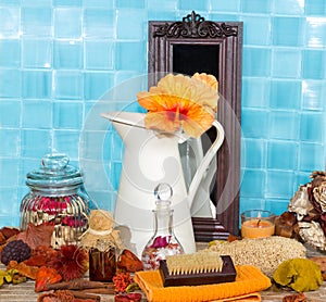 Spa still life with hibiscus flower in a jug