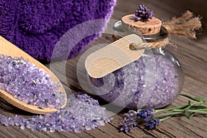 Spa still life with lavender bath salt and cardboard