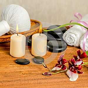 Spa still life of orchid flower, Cambria, thai herbal compress b