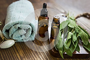 Spa still life setting with sage oil