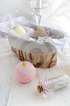 Spa still life  treatment. Composition with bath bombs and sea salt on white background.