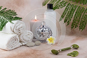 Spa still life treatment composition on massage table in wellness center