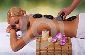 Spa Stone Massage. Beautiful Blonde