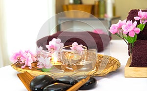 Spa Thai setting for aroma therapy with flower on the bed, relax and healthy care, soft and select focus.