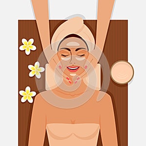 Spa therapy. Girl getting facial massage at spa salon
