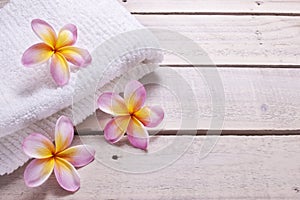 Spa Towel Flowers Wood Background