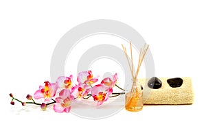 Spa towel, fragrance sticks, rocks and orchid photo