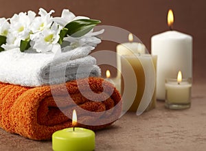 Spa towels candles and flowers