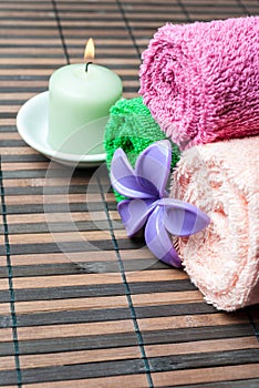 Spa towels rolls and flower.