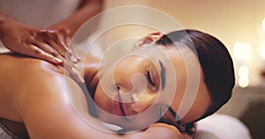 Spa, treatment and back massage for woman, smile and spine for stress relief. Pamper, beauty and luxury with masseuse