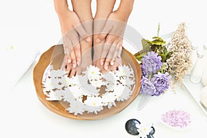 Spa treatment and product for hand and foot spa with flowers and water