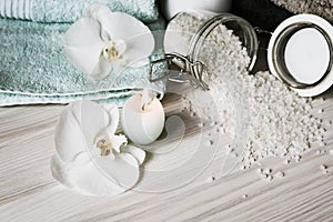 Spa treatments. Towels, sea salt and a candle