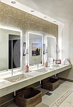 The vanity in a modern spa changing room.