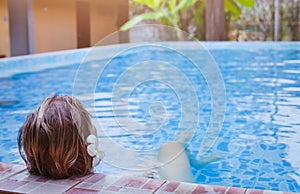 Spa and wellness background, woman relaxing in luxurious thermal bath pool