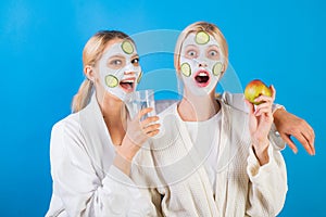 Spa and wellness. Girls friends sisters making clay facial mask. Anti age mask. Stay beautiful. Skin care for all ages