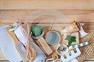 Spa and wellness setting with natural soap, candles and towel.