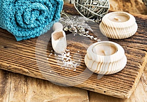 Spa and Wellness Setting on Wooden Background with Candles and L