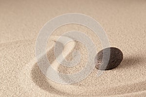 Spa wellness stone therapy background with raked sand