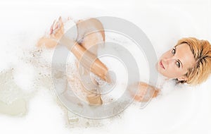 Spa and Welness Concepts and Ideas. Sensual Caucasian Blond Woman Taking Bath