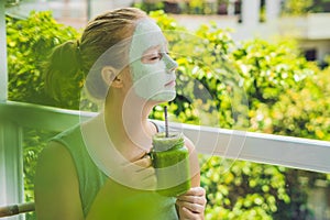 Spa Woman applying Facial green clay Mask. Beauty Treatments. Fr