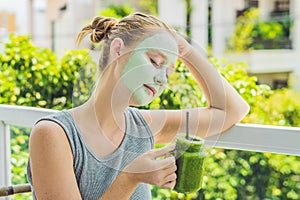 Spa Woman applying Facial green clay Mask. Beauty Treatments. Fr