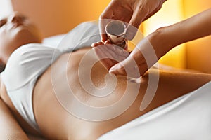 Spa woman. Aromatherapy oil massage