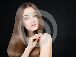 Spa Woman with Long Healthy Hair on Dark
