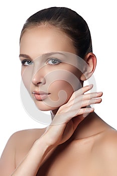 Spa woman. Natural beauty face. Beautiful girl touching her face