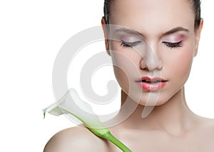 Spa woman portrait. Young face with flower isolated