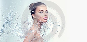 Spa woman with splashes of water