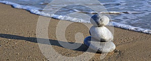 Spa zen stones on beach.