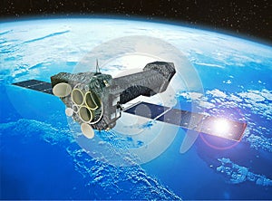 Space earth and satellite in orbit for surveillance, communication and global research. Aerospace, engineering and