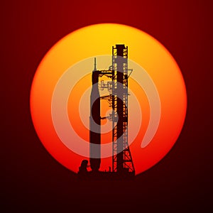 Space Launch System On Launchpad Over Background Of Red Sun