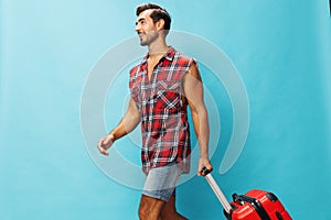 Trip man happy vacation traveler baggage weekend guy travel flight journey background suitcase studio