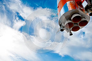 Space rocket engine nozzles against the sky