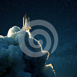 Space rocket launches into space against a starry blue sky. Ship shuttle with clouds of smoke.