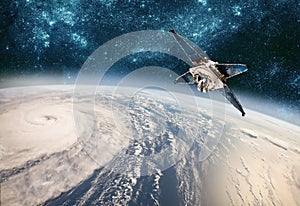 Space satellite monitoring from earth orbit weather from space, hurricane, Typhoon on planet earth