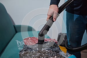 Space saver saving seal bag sucking air vacuum clothing storage compressed package.