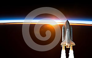 Space Shuttle takes off into space. Elements of this image furnished by NASA