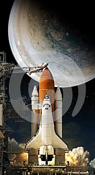 Space Shuttle takes off into space on jupiter background. Elements of this image furnished by NASA
