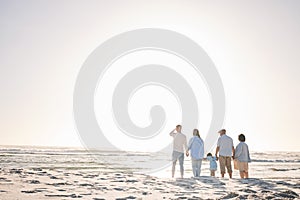 Space, travel and holding hands with big family on beach for vacation, bonding and love. Summer, care and relax with