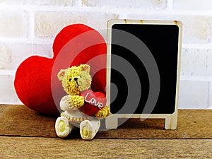 Space wooden background with teddy bear couple