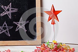 Space written on a blackboard with chalk, caramel, candy, star, wand, valentines day, sweet tooth lollipop door sign