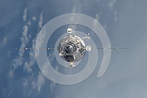 The spacecraft is docking. Elements of this image were furnished by NASA