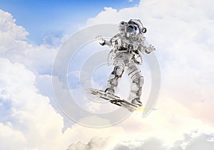 Spaceman on flying board. Mixed media