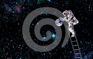 Spaceman traveling in space.mission in outer space photo