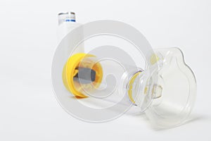 spacer, asthma inhaler isolated on white background