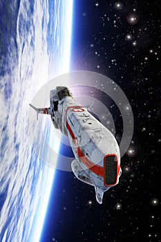 Spaceship fighter orbiting planet photo